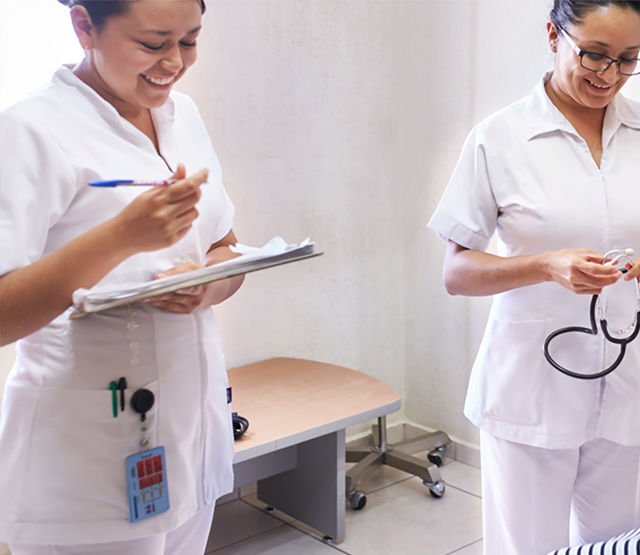 2 Nurses with clipboard and stethoscope
